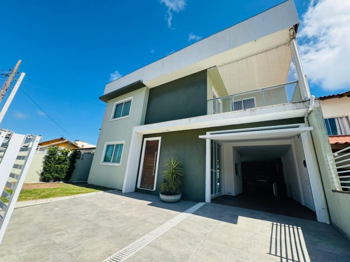Foto 1 - Excelente opção! Casa com piscina aquecida próximo ao mar.